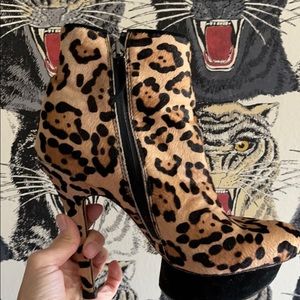 L.A.M.B. calf hair ankle booties.